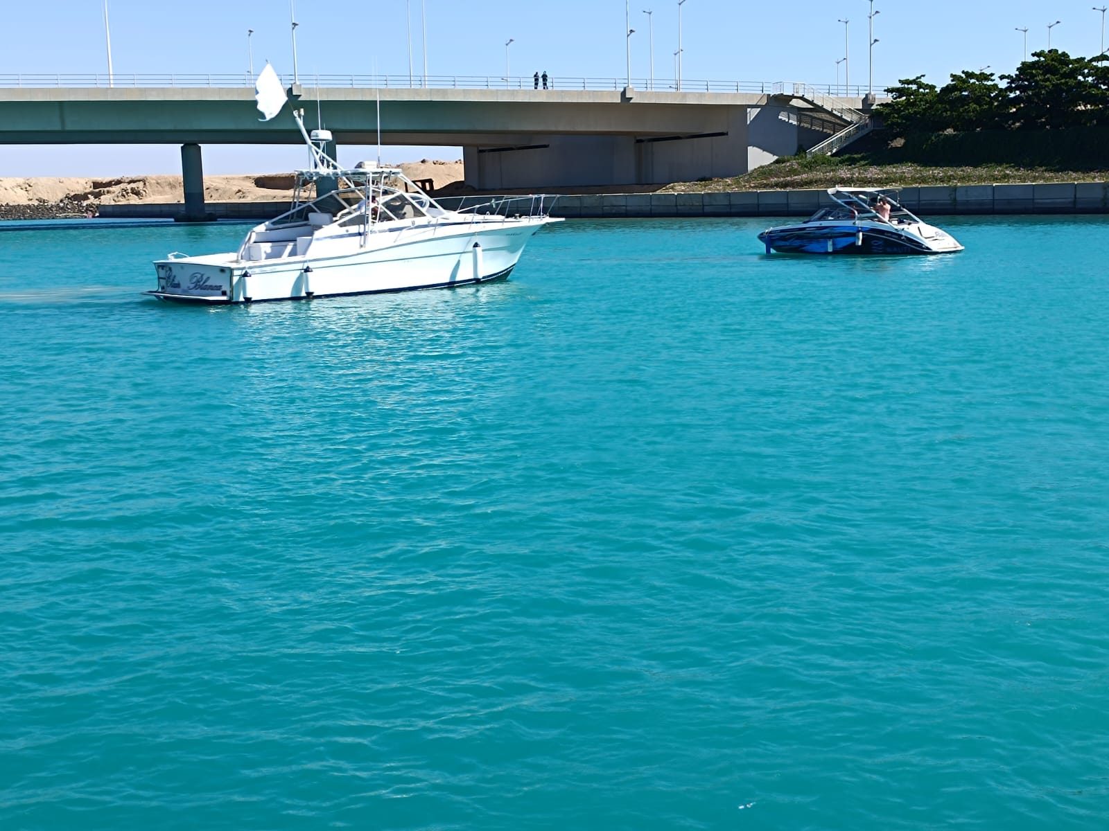 Boats on the turquoise water at King Abdullah Economic City