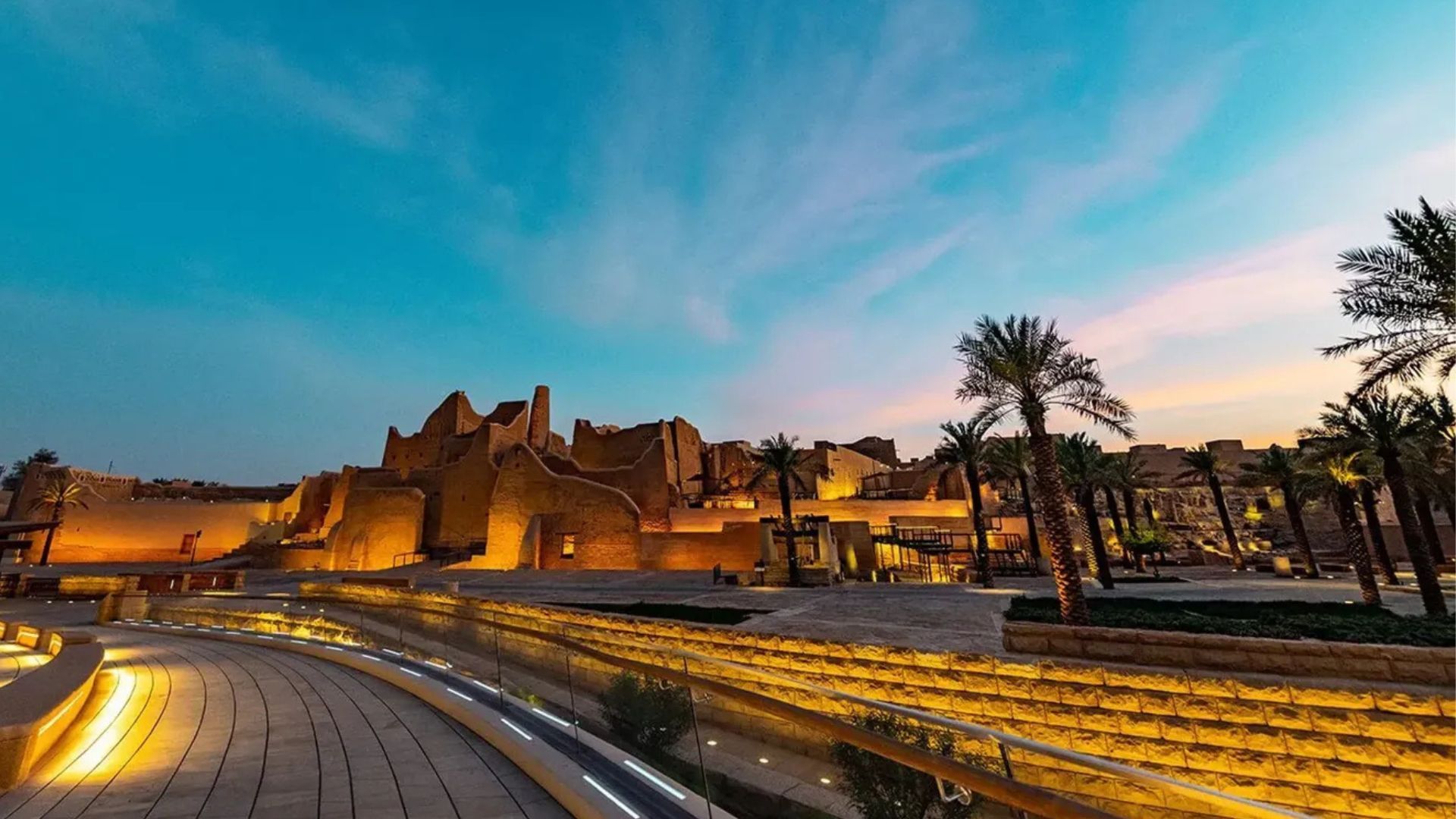 At-Turaif’s mudbrick towers lit at dusk in Diriyah